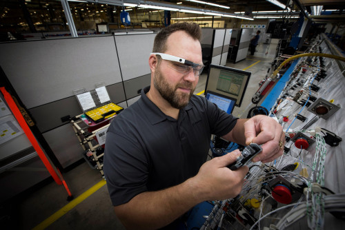 Boeing Mesa Employee works on electrical cable harness wiring in the Electrical Center of Excellence.