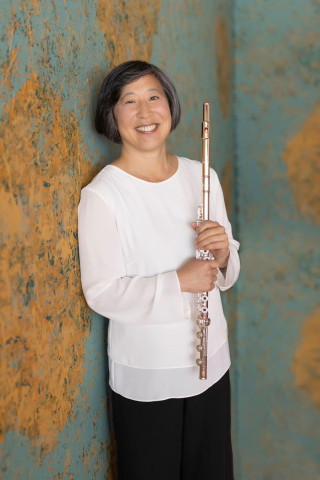 Dr. Elizabeth Buck with flute