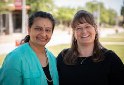 Dr. Puvana Ganesan and Professor Julie Garner standing next to each other