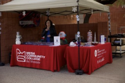 MCC employee Cheryl Hardt under a red tent