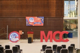 Large block letters spelling MCC 