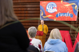 MCC Employee Rob Budach welcoming guests at the 60th Anniversary Finale at the Red Mountain Campus