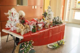 Vendor at a table with holiday decorations