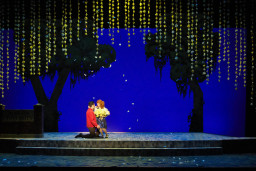 Cast members on stage in Big Fish Daffodils
