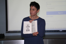Kate Mohler holding a book