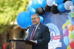 MCC President Dr Daniel speaking at podium