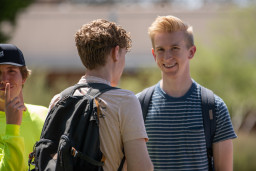 3 students having a conversation