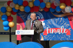 Dr. Richard Daniel addressing attendees at the podium