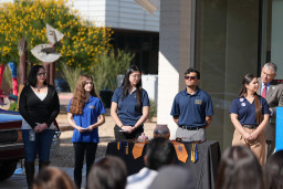Members of PTK standing with time capsule