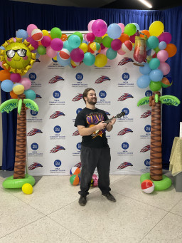 Student playing ukelele