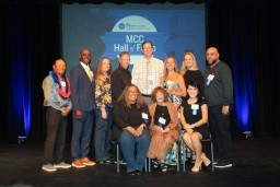 The 2023 class of inductees to the MCC Hall of Fame gather fo r a group photo.