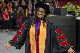 MCC professor Dr. Puvana Ganesan in her graduation cap and gown