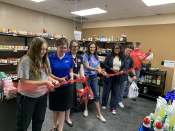 Ribbon cutting ceremony of the Mesa Market Pantry at RM