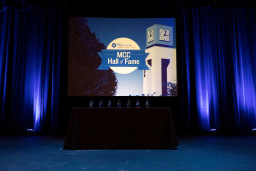 Hall of Fame awards on a table on the stage