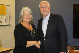 MCC retiree, Vicki Gallegos shaking hands with Senator John McCain