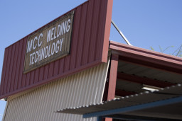 Sign on building that reads "MCC Welding Technology"