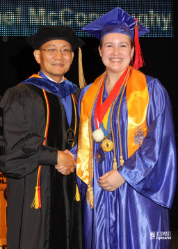 Dr. Pan congratulates Heather Smyth
