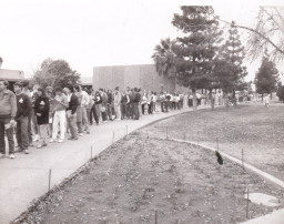 Students line up to register under the old registration process