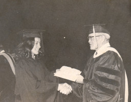 President John Riggs hands a diploma to an MCC graduate, 1968