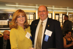 Hall of Fame inductees Diana Occhiuzzi and Duane Oakes share memories before the start of the induction ceremony.