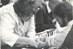 Donating blood at a Health Fair event, Southern & Dobson Campus, 1981