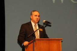 Alumni Advisory Board Chairman Wade Denman reads brief bios for Hall of Fame honorees.