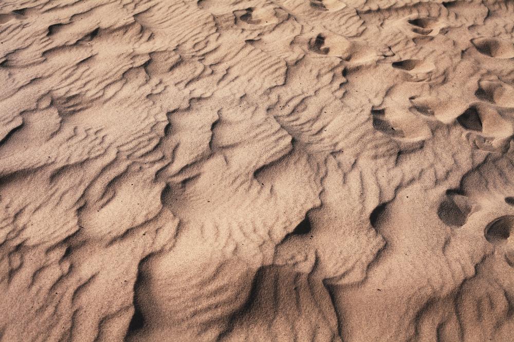 Photograph of textures in the sand.