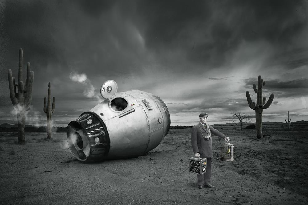 Black and white digital composite of a traveler with his time machine.