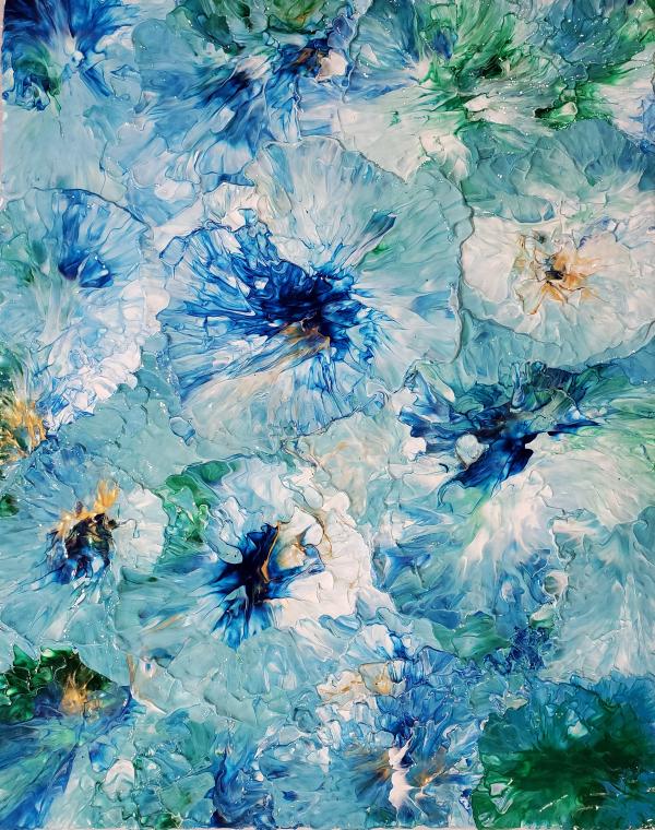 Abstract painting of flowers in blue, green and yellow.