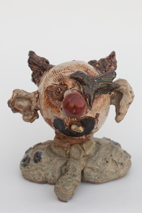 A sculpture of a ceramic head.