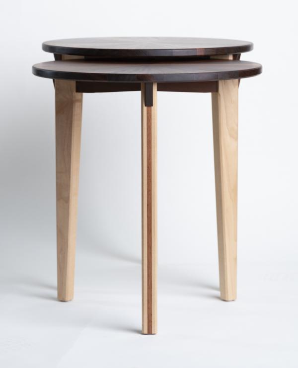 Photograph of handmade, wooden, nesting tables.