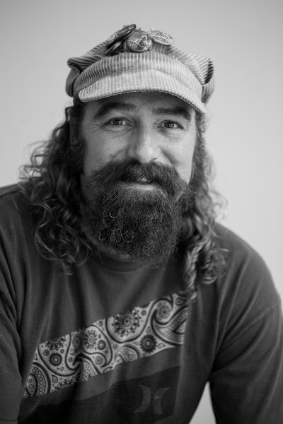 A headshot photograph of artist Jeremy Schmidt.