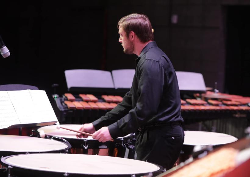 performer playing drums