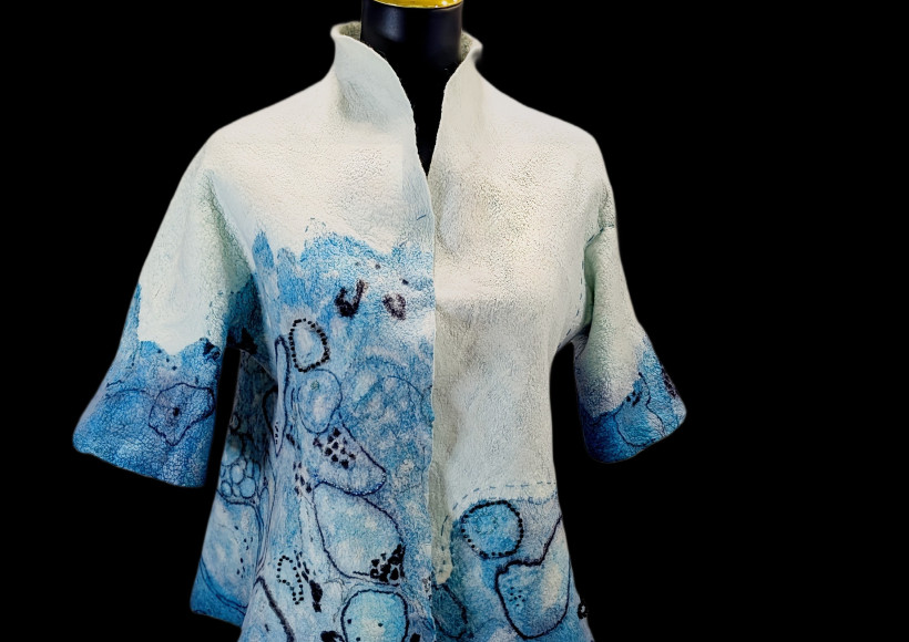wool felted womens jacket displayed on a dress form