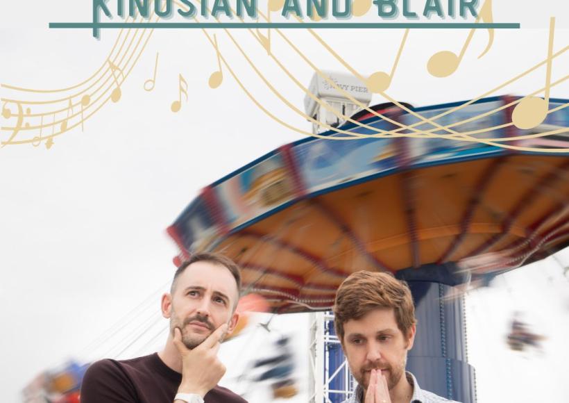 Kinosian and Blair contemplating in front of amusement park ride