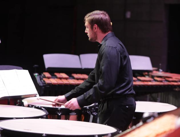 performer playing drums