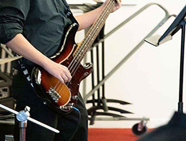 Closeup of an electric guitar.