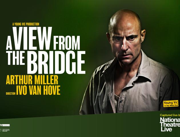Bald man with fierce expression on green background