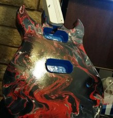 Multi-colored resin composite guitar