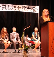MCC student Emily Chase at podium. MCC student Emily Chase at podium.