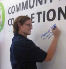 Student Signing the Wall