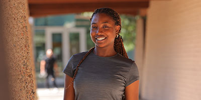 A female student looking at the camera.