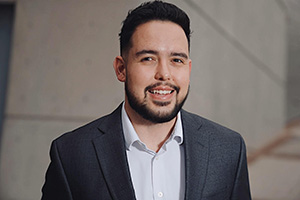 Headshot of Benjamin Troglia.