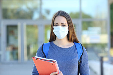 student wearing a mask