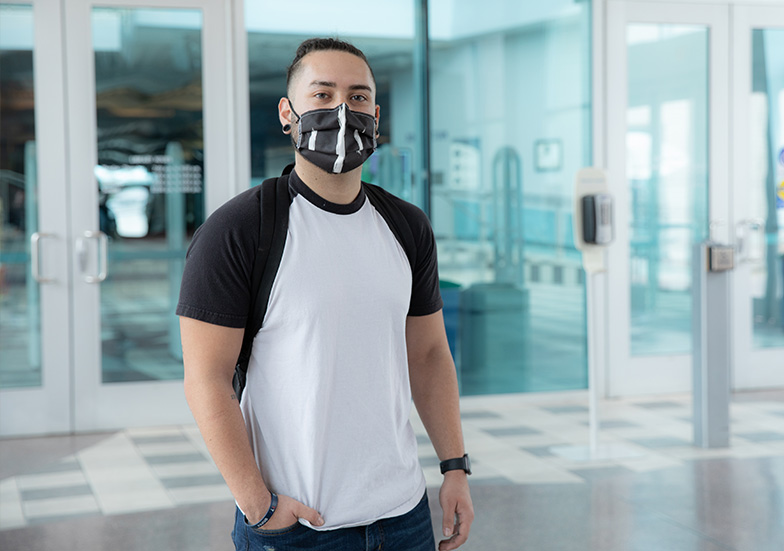 Student wearing mask on campus
