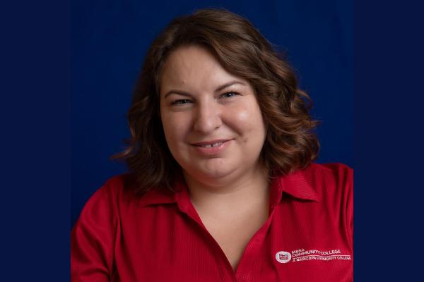 Headshot of Brenna Sapper.