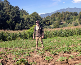 Riley Anderson in potato field