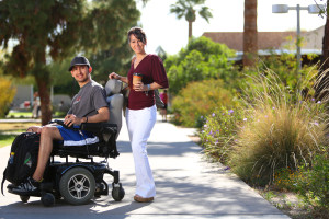 Students on campus, including student with in wheelchair