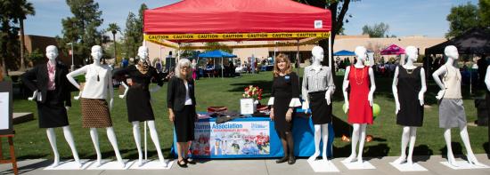 Alumnae Diana Occhiuzzi and Mary Chavez with mannequins on campus.