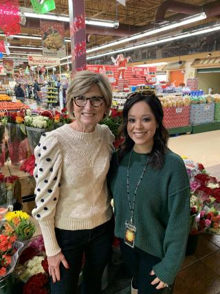 Jenn Duff and Priscilla Gutierrez standing in a grocery store